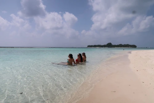 Familia Isabel disfrutando del las playas de Maldivas